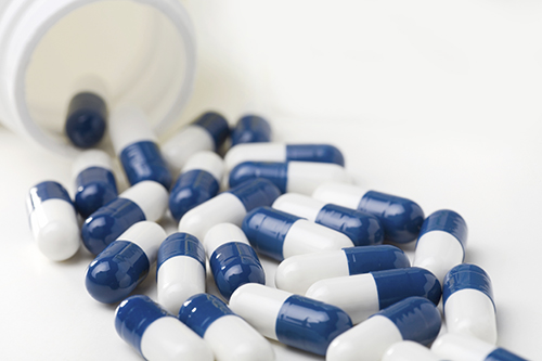 Medicine Capsules Spilled from Prescription Bottle